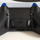 Instead of longer paddles, the Instinct and Instinct Pro now use smaller buttons that are easier to press when naturally holding the controller.